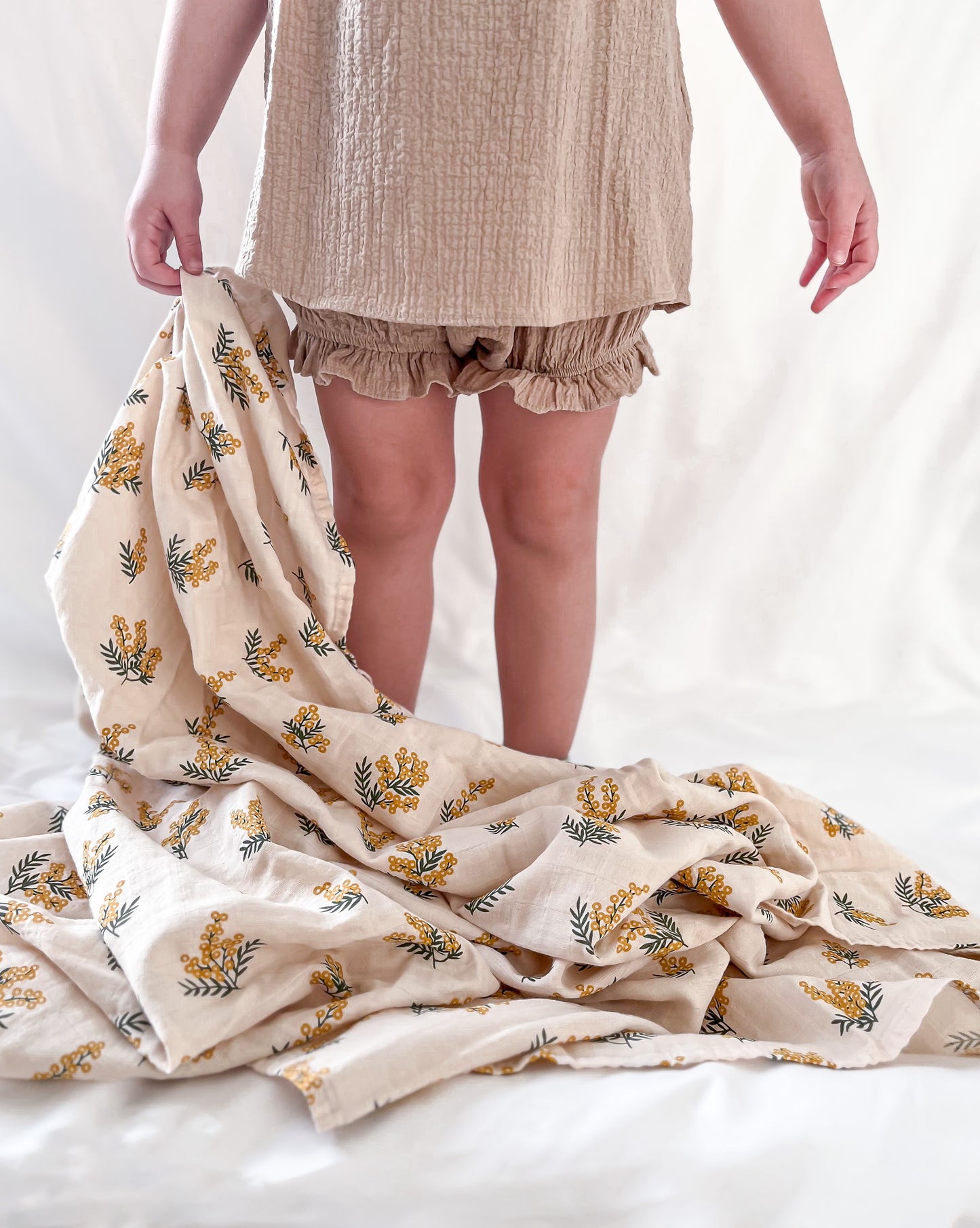 The Yellow Blossom Muslin Swaddle